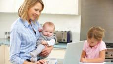 Mom with kids using computer